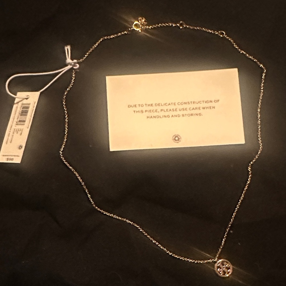 Elegant Tory Burch Gold Pendant Necklace